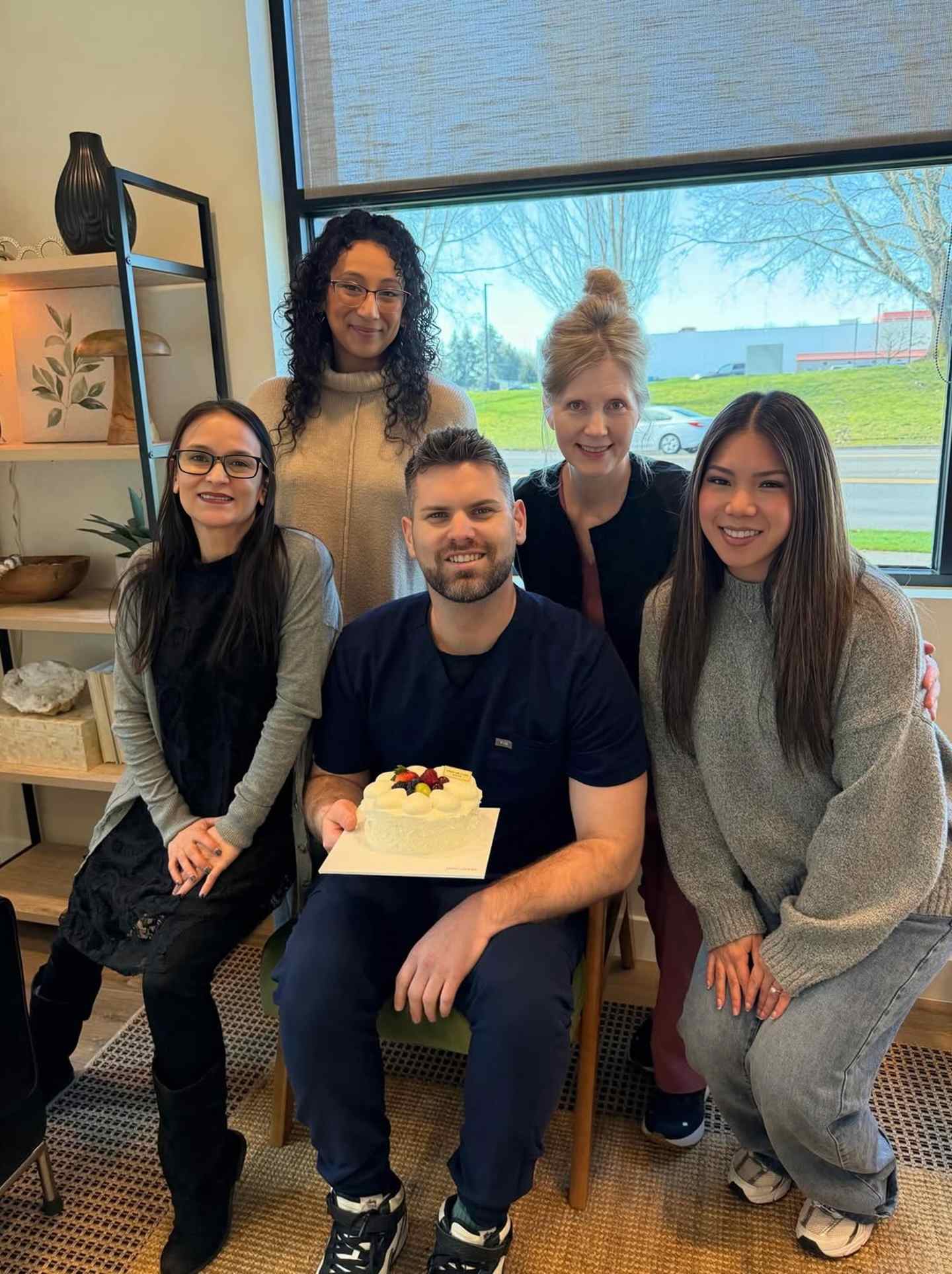 Vibe Orthodontics team celebrating with Dr. Brandon Zegarowski in the Hillsboro, OR office